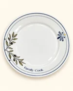 Outra vista do prato raso branco Family Cook com ramo de oliveira e detalhe floral azul e amarelo